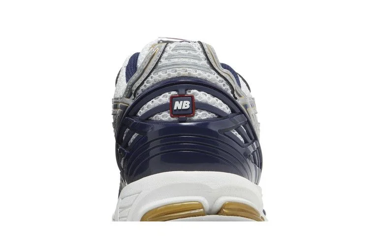 Кроссовки New Balance 1906R 'White Navy Gold'