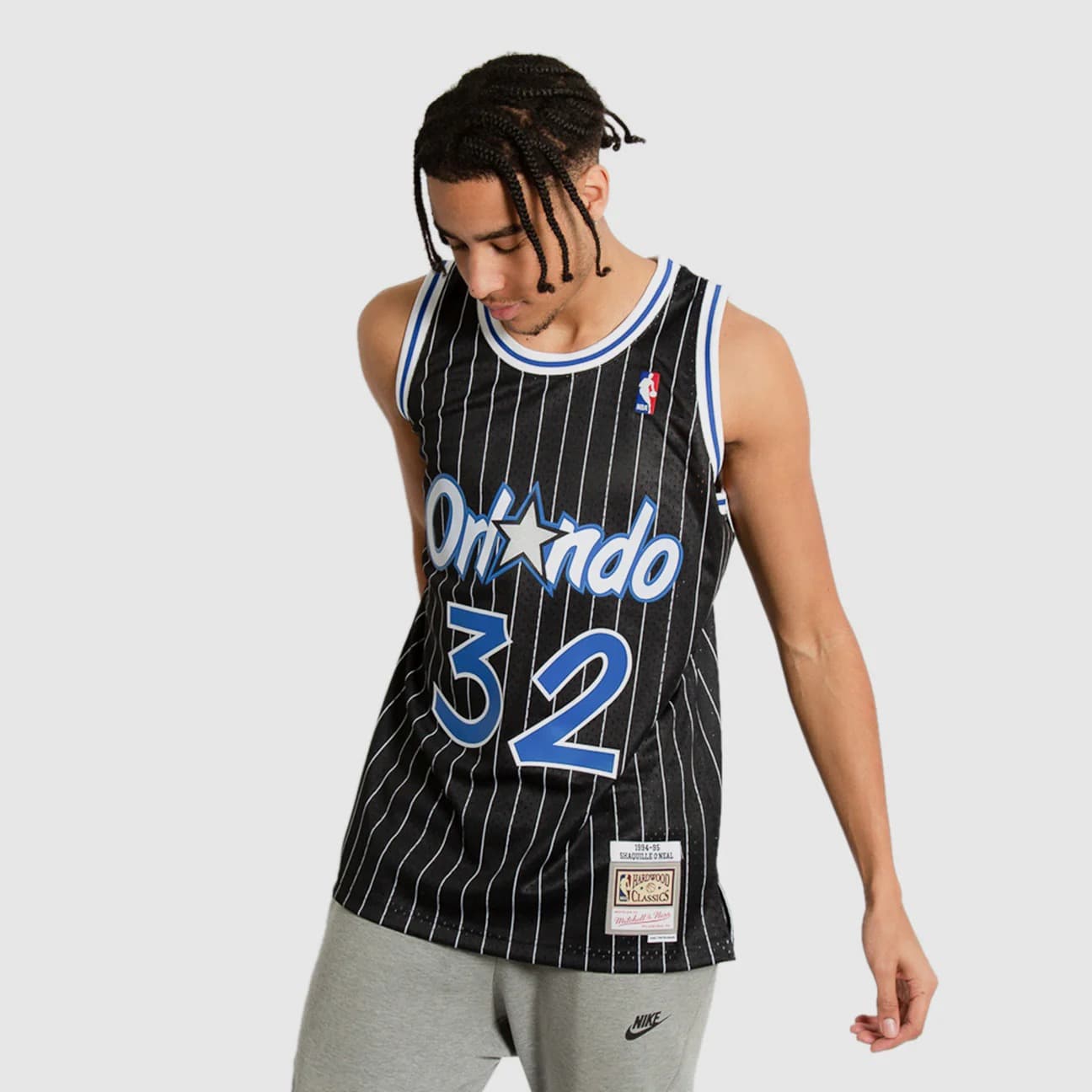 1994-95-orlando-magic-shaquille-o-neal-32-swingman-hardwood-classics-black-pinstripes-jersey