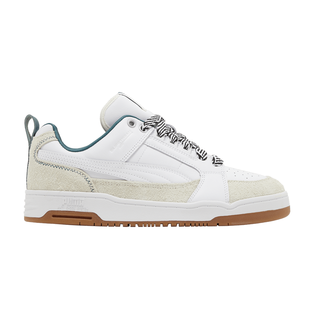 ami-x-slipstream-lo-white-green-gum-387703-01