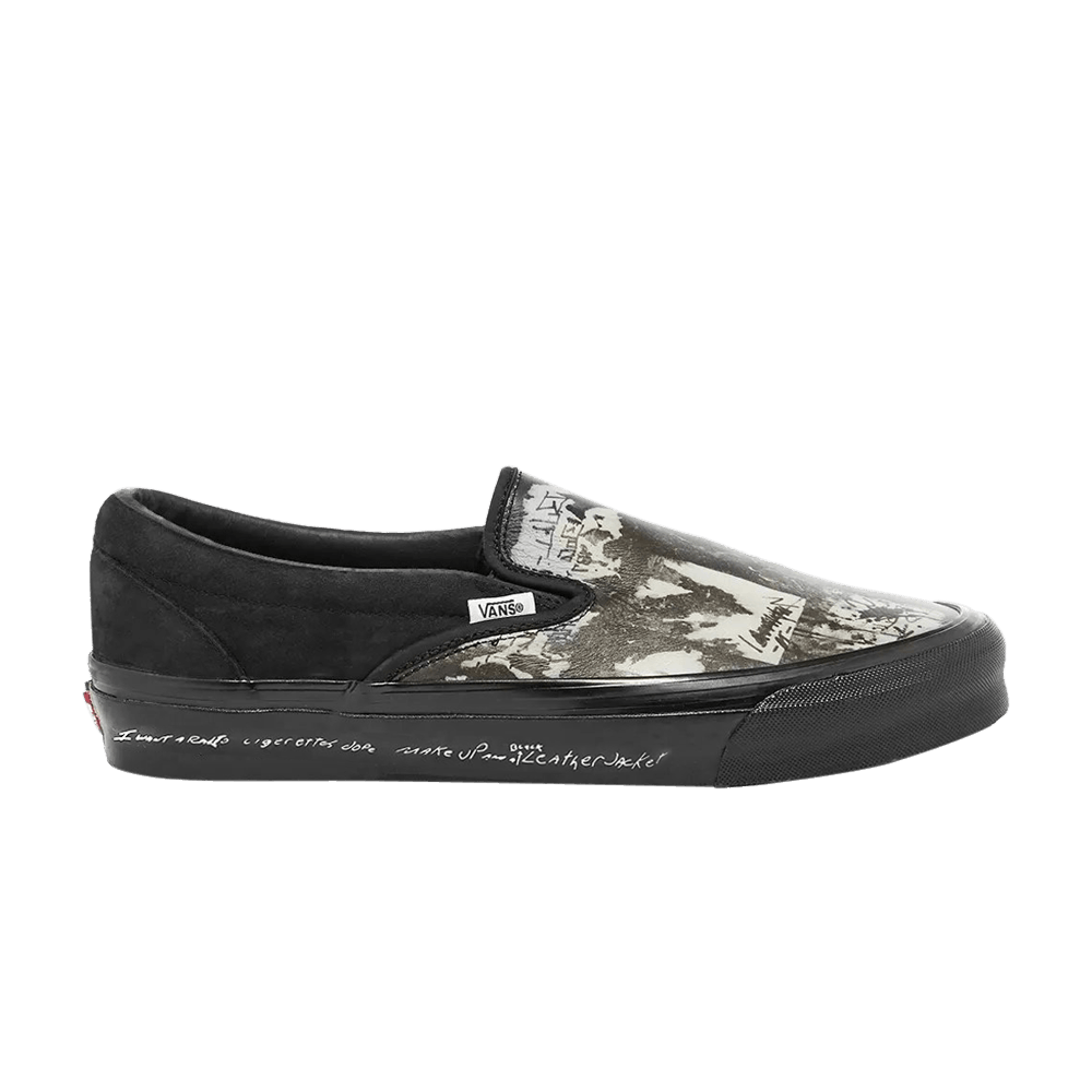 raised-by-wolves-x-og-classic-slip-on-lx-black-wall-vn0a45jk025
